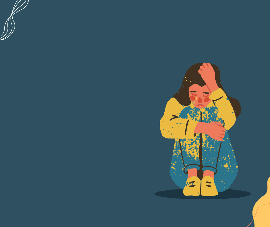 kobieta siedzi i płacze